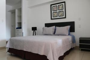 Lova arba lovos apgyvendinimo įstaigoje Terrazas Apartments Miraflores