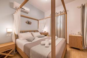 Postel nebo postele na pokoji v ubytování Kokona