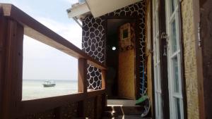 Balkón nebo terasa v ubytování Pari Solata Seaview Homestay Syariah