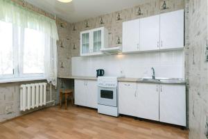 Кухня или мини-кухня в Apartment on Grygorenko street
