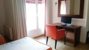 Postel nebo postele na pokoji v ubytování Hotel Alfageme