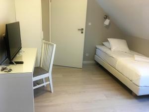 Posteľ alebo postele v izbe v ubytovaní Grota Bochotnicka