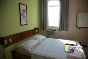 Postel nebo postele na pokoji v ubytování Hotel Porto Da Barra