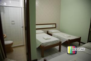 Postel nebo postele na pokoji v ubytování Hotel Porto Da Barra