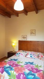 A bed or beds in a room at Apartamentos Guadalupe