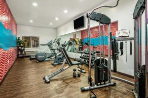 a gym with cardio equipment in a room at La Copa Inn Beach Hotel in South Padre Island