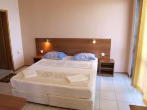 Cama o camas de una habitación en Guestrooms Maria Antoaneta