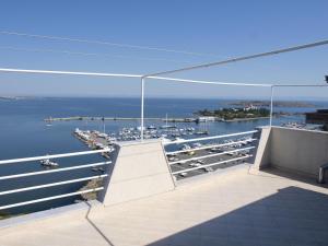 a balcony with a view of a marina at Guestrooms Maria Antoaneta in Sozopol