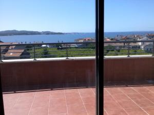 a view of the water from a balcony at Cambados Apartamento VUT-PO-TU986D in Cambados