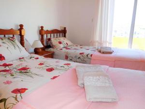 Cama o camas de una habitación en Sunny Beach Apartment