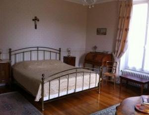 Postel nebo postele na pokoji v ubytování Château des Bouffards