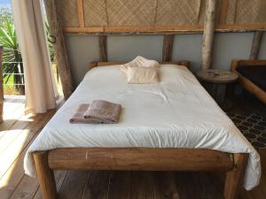 Postel nebo postele na pokoji v ubytování Hacienda Monteclaro