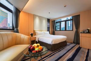 Katil atau katil-katil dalam bilik di Metropark Hotel Mongkok