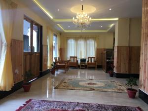 Predel za sedenje v nastanitvi Hotel Khamsum