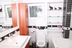 Kúpeľňa v ubytovaní Apartmani Nova
