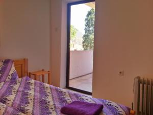 Cama o camas de una habitación en Guest House Zora