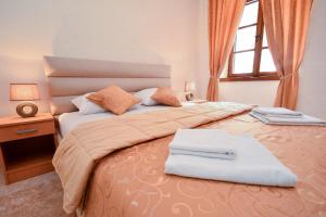 Krevet ili kreveti u jedinici u okviru objekta Apartments Casa di Cattaro