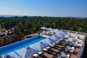 Bazén v ubytování Silver Sands Serenity Resort, Candolim nebo v jeho okolí