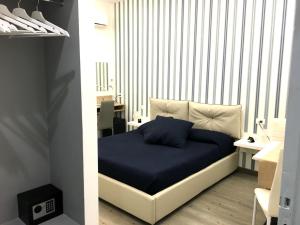 Krevet ili kreveti u jedinici u okviru objekta Deluxe B&B Centrocitta