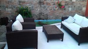 A seating area at Villa Alessi B&B