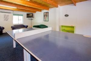 a ping pong table in a room at Shepparton Holiday Park and Village in Shepparton