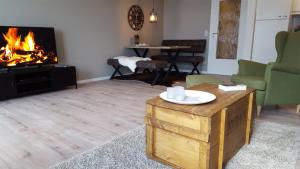 Posezení v ubytování Ferienwohnung Hafenblick