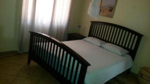 Cama o camas de una habitación en Villa Heteka