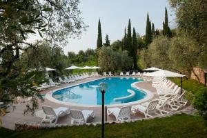 Bazén v ubytování Hotel Residence Rely nebo v jeho okolí