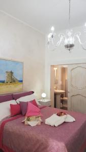 Voodi või voodid majutusasutuse Baia Di Torre Squillace toas