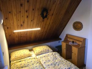 Postel nebo postele na pokoji v ubytování Chata Lucia