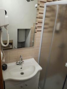 Koupelna v ubytování Guest House Kvartin