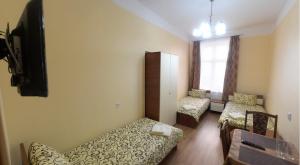Posteľ alebo postele v izbe v ubytovaní Apartment on Voloshyna