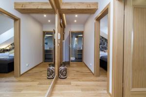 Posteľ alebo postele v izbe v ubytovaní udanypobyt Apartamenty Tuwima