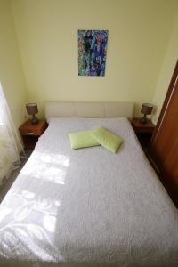 Ein Bett oder Betten in einem Zimmer der Unterkunft Apartment Zubčić