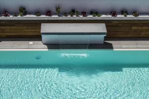 Bazén v ubytování Hotel Baia nebo v jeho okolí