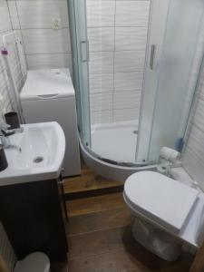 Kúpeľňa v ubytovaní Apartment Przymorze II + 14 fotografií