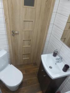 Kúpeľňa v ubytovaní Apartment Przymorze II