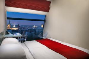 Posteľ alebo postele v izbe v ubytovaní Metropol Design Hotel Old Town