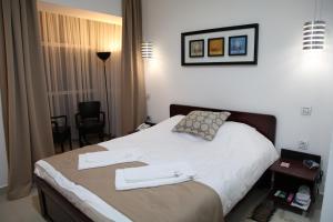 Katil atau katil-katil dalam bilik di Hotel Zeder Garni