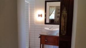 Ένα μπάνιο στο Bauhenia Guesthouse +44 φωτογραφίες