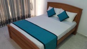 Letto o letti in una camera di Sunhill Lake Tourist Rest