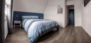 Posteľ alebo postele v izbe v ubytovaní H.A.N.D Surf Hostel