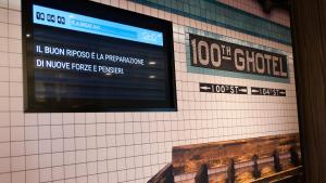 a television on the wall of a subway station at G Hotel Pescara in Pescara