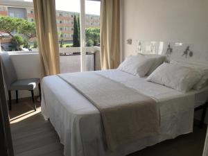 Ένα ή περισσότερα κρεβάτια σε δωμάτιο στο Megi San Peter Apartment +33 φωτογραφίες