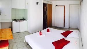 Posteľ alebo postele v izbe v ubytovaní Linda Apartment