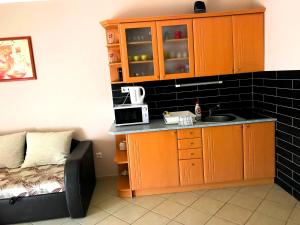 Kuchyňa alebo kuchynka v ubytovaní Princess Luxus Apartman