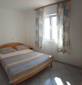 Katil atau katil-katil dalam bilik di Apartments Petar Maksan