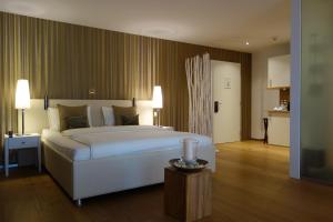 Ліжко або ліжка в номері Hotel AVA