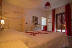 A bed or beds in a room at B&B Costa D'Abruzzo