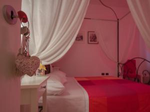 A bed or beds in a room at B&B Costa D'Abruzzo